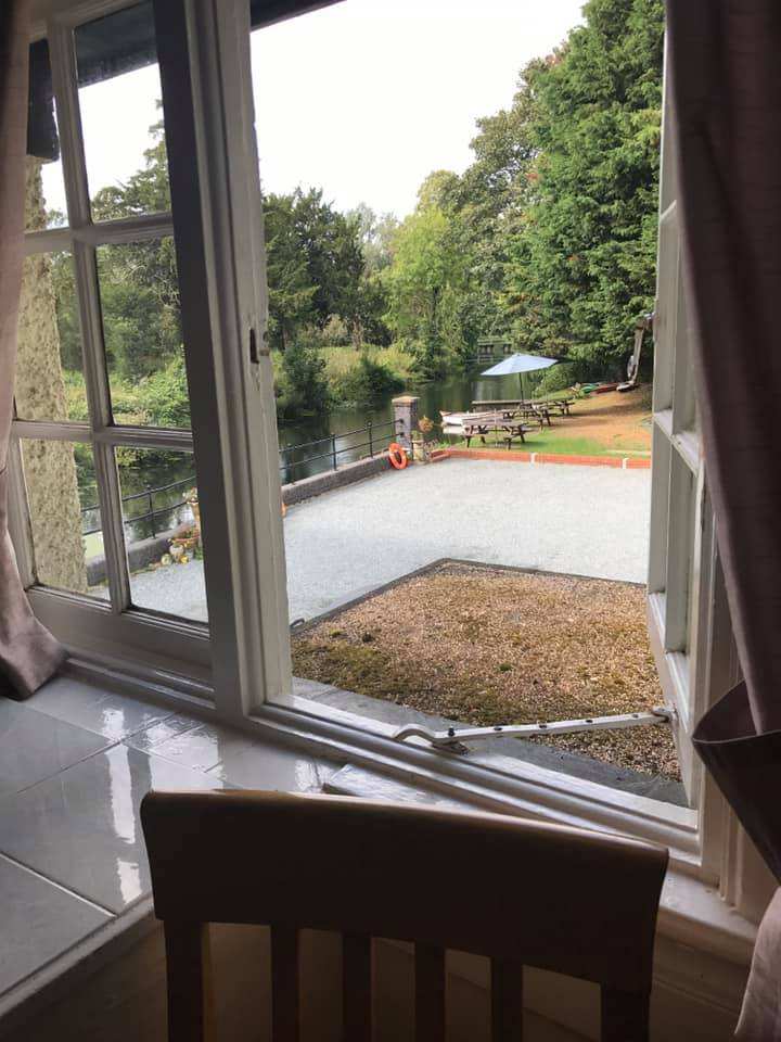 The river seen through an open window at the hotel