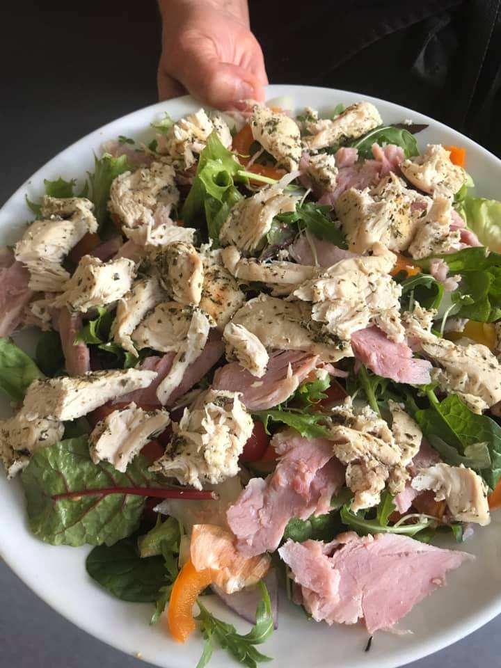 A large chicken and ham salad