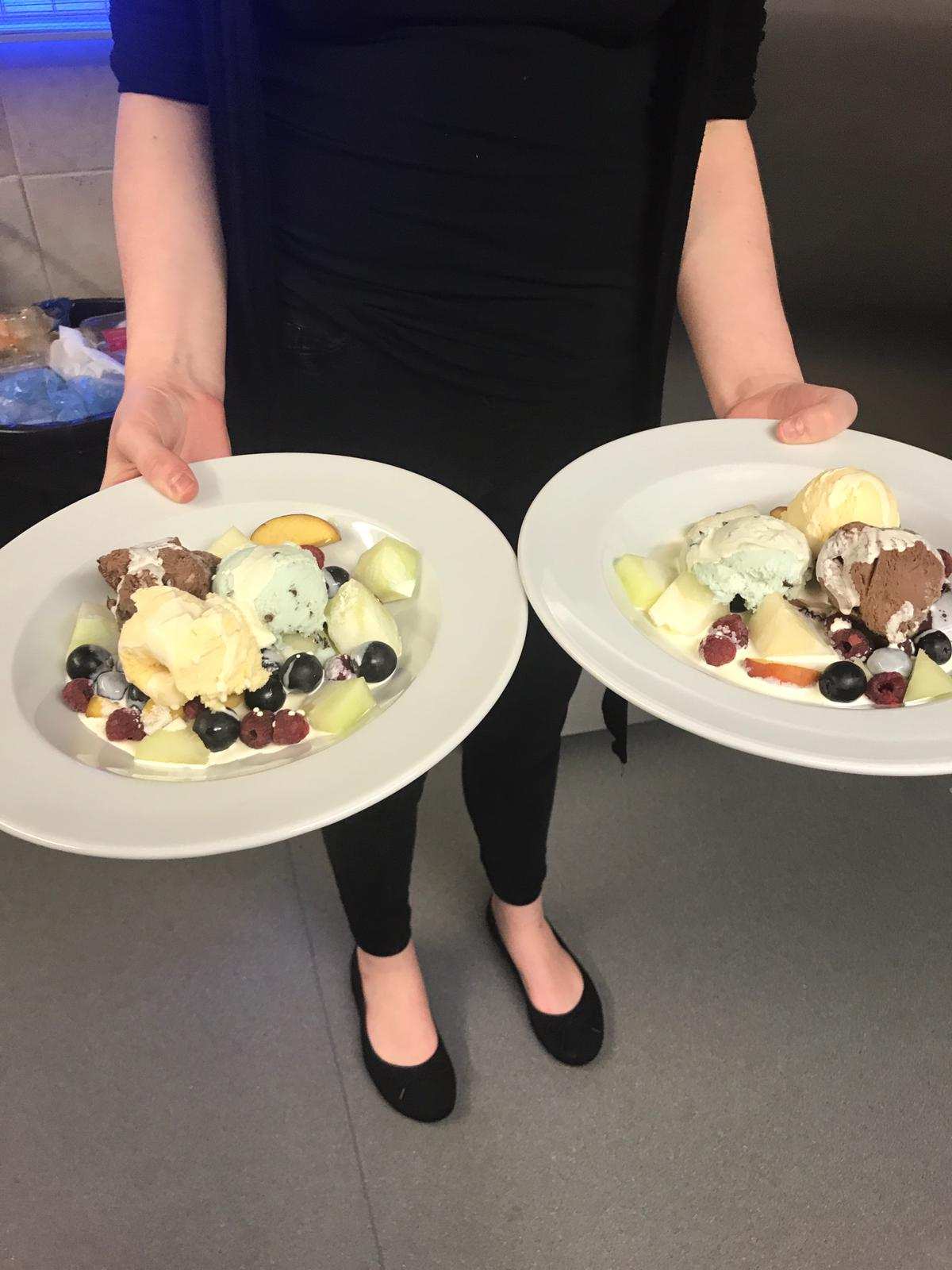 Fresh fruit salad with ice cream and cream