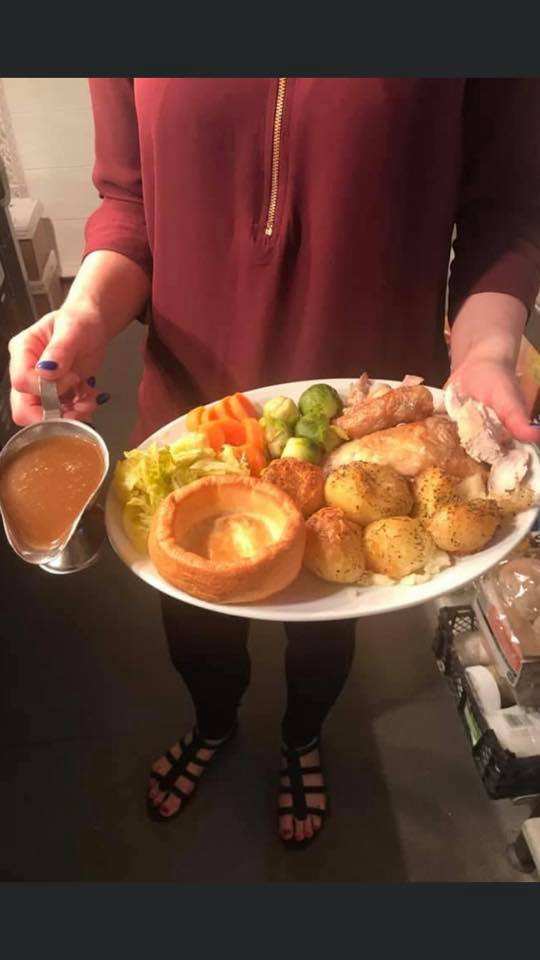 A Sunday roast with Yorkshire pudding being served