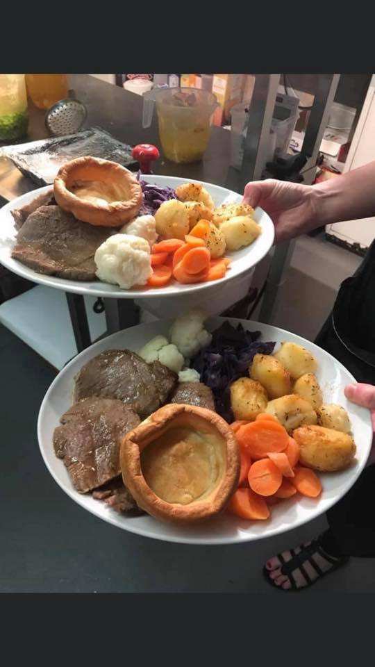 Two plates of Sunday roast