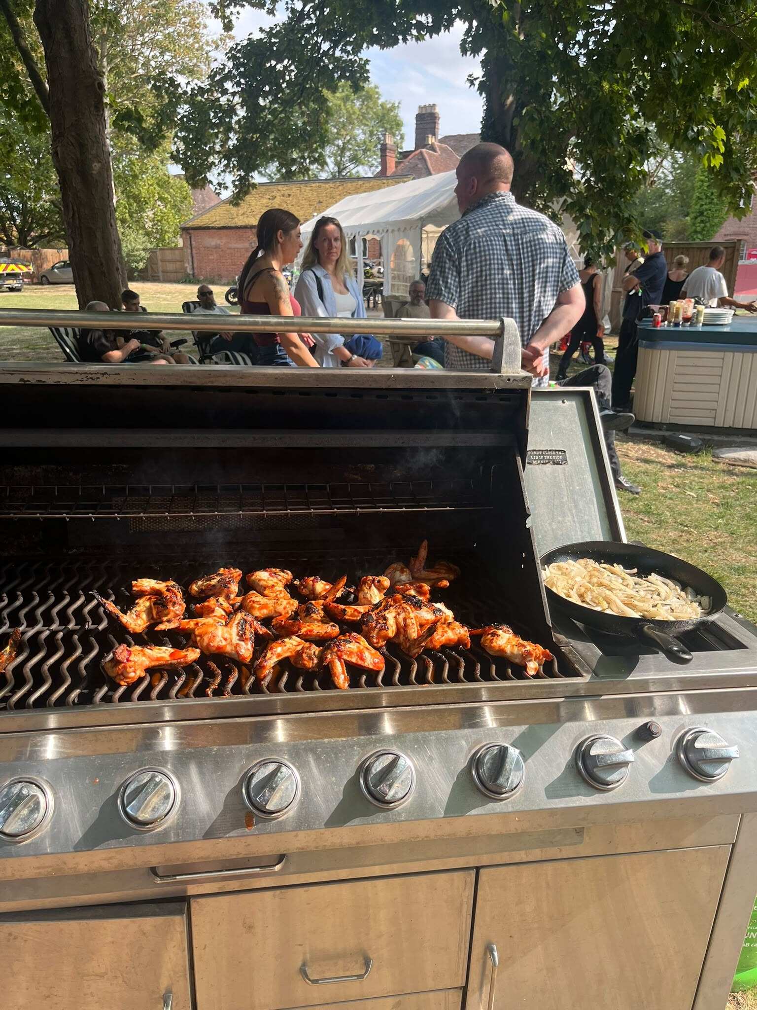 Chicken on the barbecue at a garden party