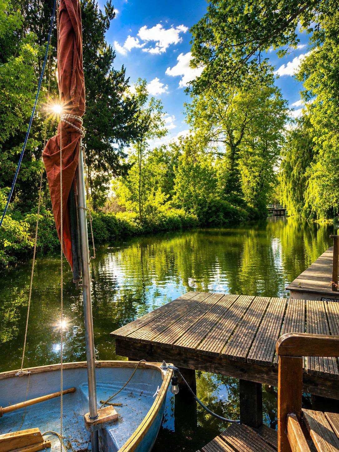 The hotel's wooden jetty on the river